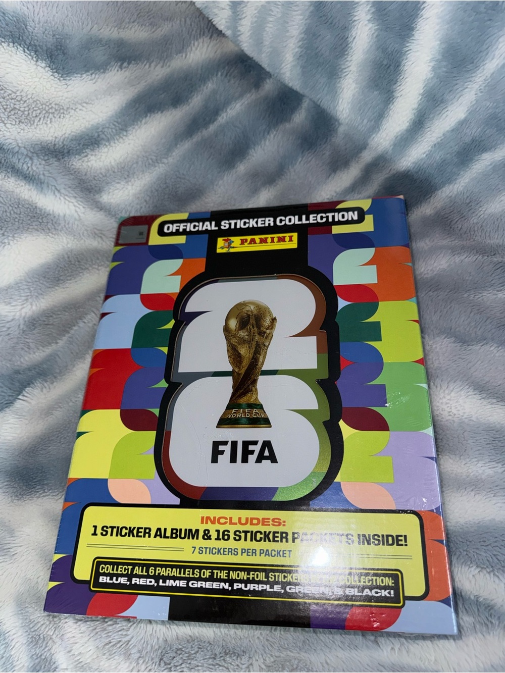 Panini FIFA Sticker Album – Gold Emblem with Multicolor Geometric Cover